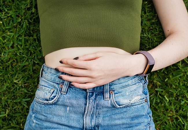 Women touching her belly